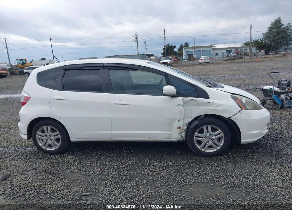 2012 HONDA FIT VIN: JHMGE8G38CC032100