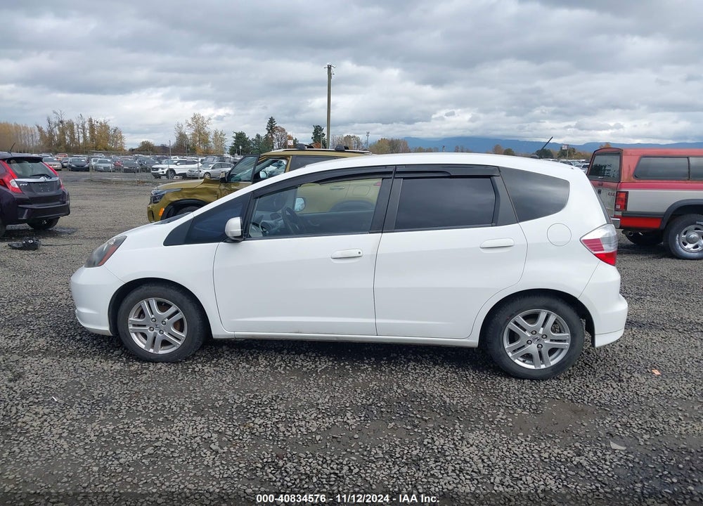 2012 HONDA FIT VIN: JHMGE8G38CC032100