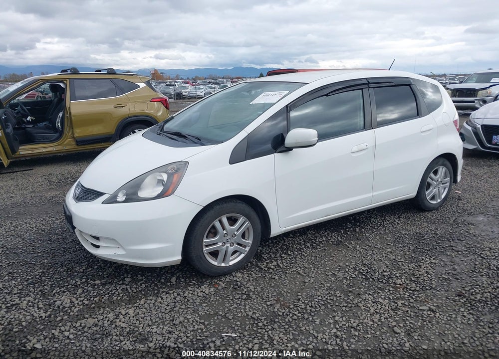 2012 HONDA FIT VIN: JHMGE8G38CC032100