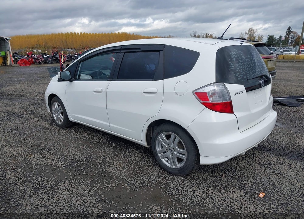 2012 HONDA FIT VIN: JHMGE8G38CC032100