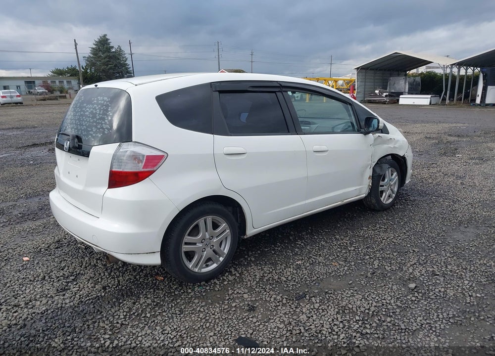 2012 HONDA FIT VIN: JHMGE8G38CC032100