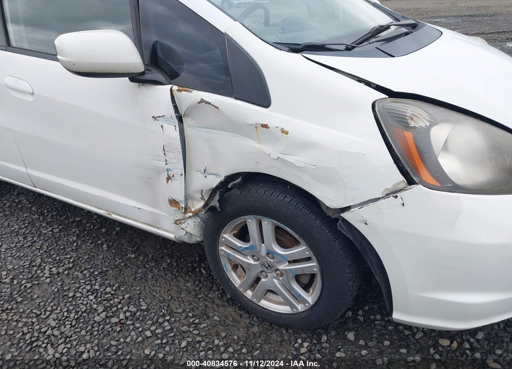 2012 HONDA FIT VIN: JHMGE8G38CC032100