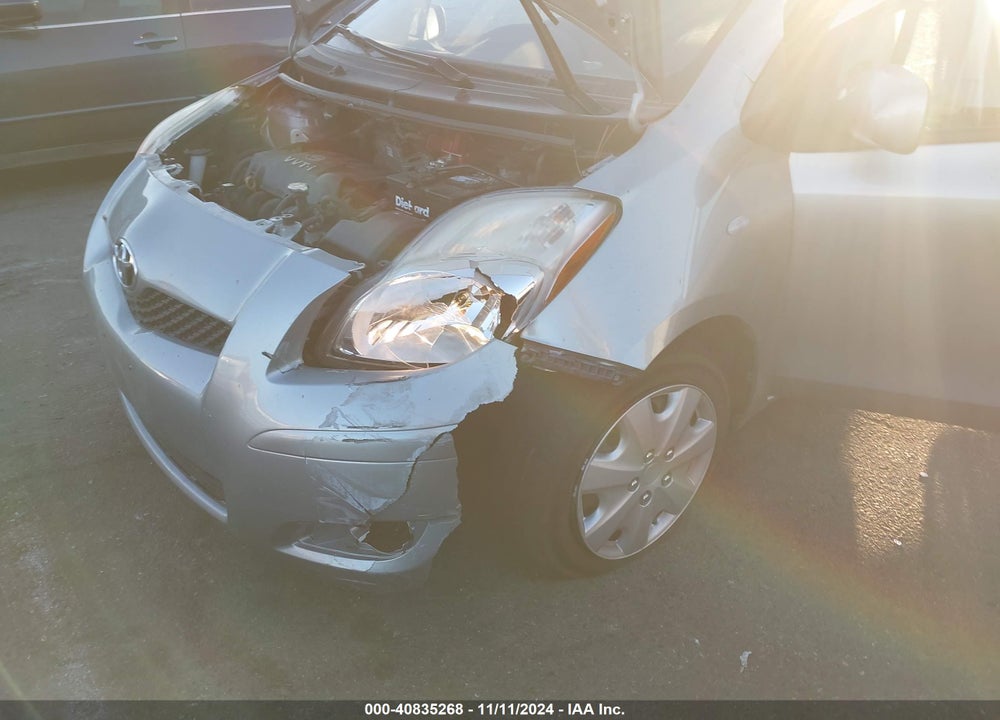 2009 TOYOTA YARIS VIN: JTDKT903395229576
