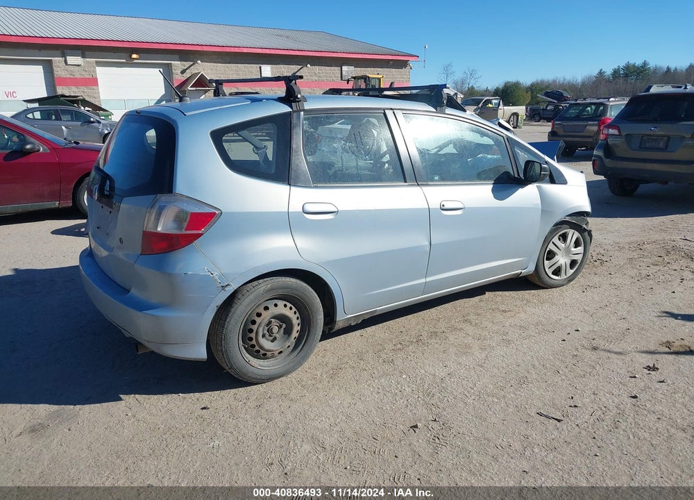 2009 HONDA FIT VIN: JHMGE87269C006742