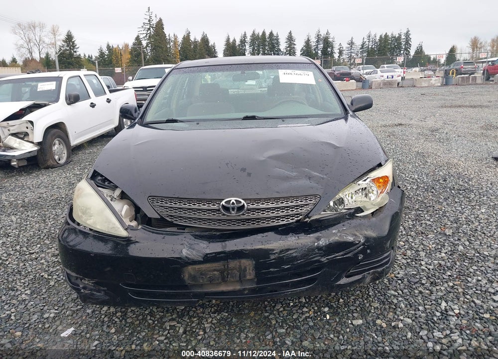 2004 TOYOTA CAMRY LE VIN: JTDBE32K140263744