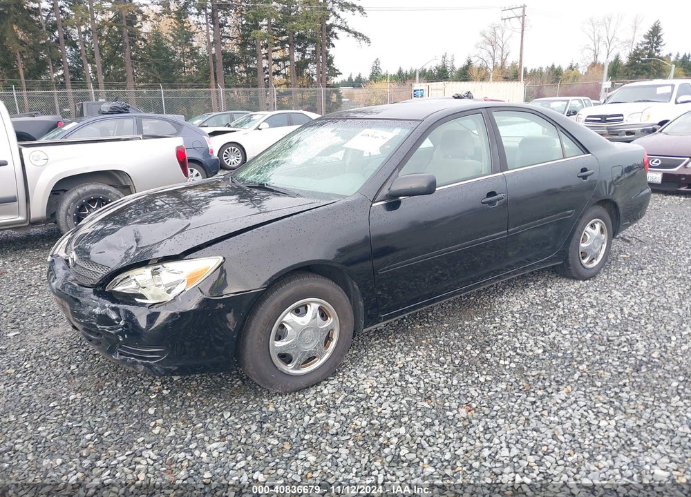 2004 TOYOTA CAMRY LE VIN: JTDBE32K140263744