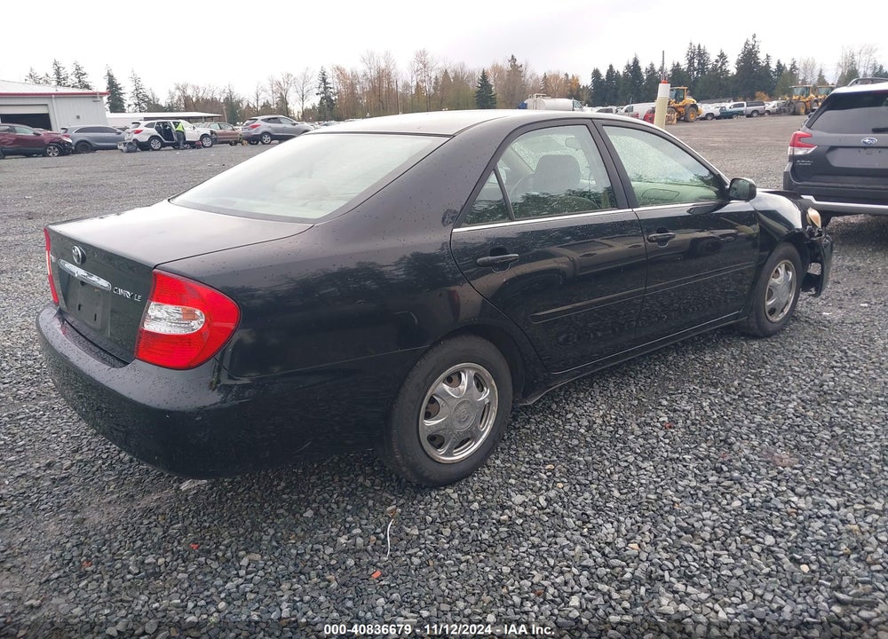 2004 TOYOTA CAMRY LE VIN: JTDBE32K140263744