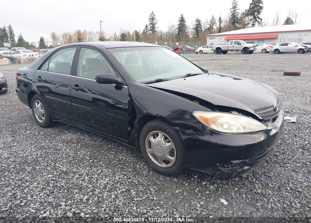2004 TOYOTA CAMRY LE VIN: JTDBE32K140263744