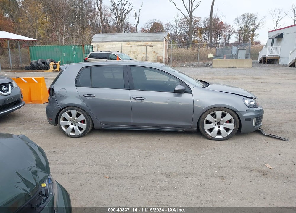 2011 VOLKSWAGEN GTI 4-DOOR VIN: WVWHD7AJXBW233357