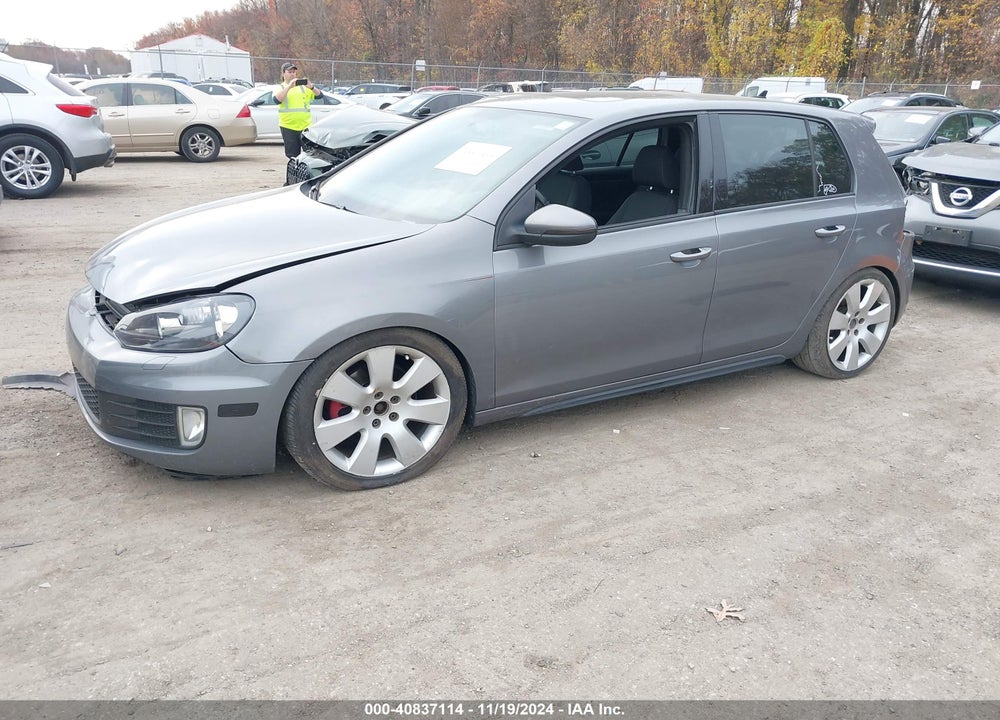 2011 VOLKSWAGEN GTI 4-DOOR VIN: WVWHD7AJXBW233357