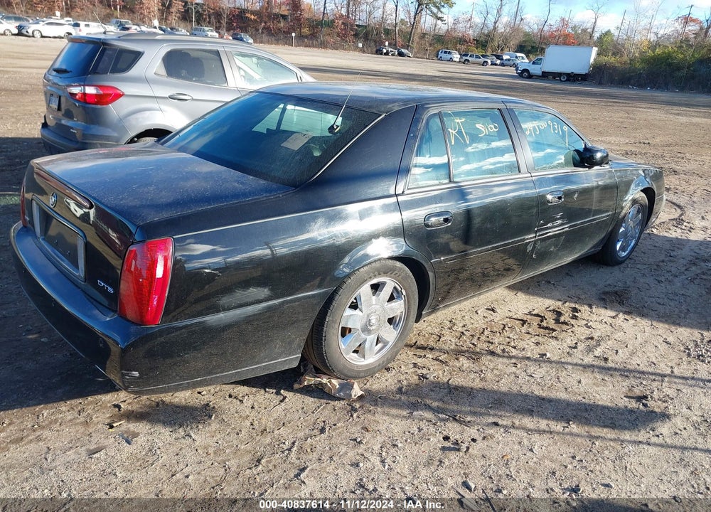 2004 CADILLAC DEVILLE DTS VIN: 1G6KF57934U260550