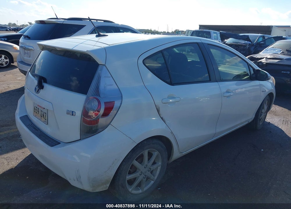 2012 TOYOTA PRIUS C FOUR VIN: JTDKDTB32C1021968
