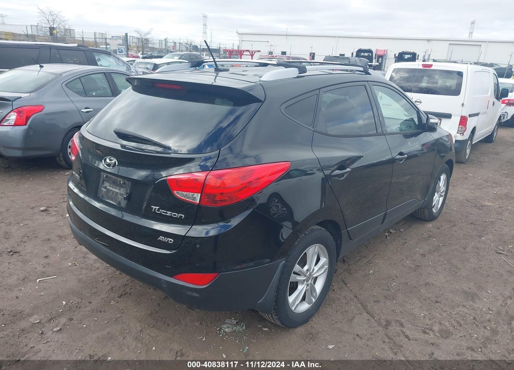 2012 HYUNDAI TUCSON GLS VIN: KM8JUCAC8CU403347