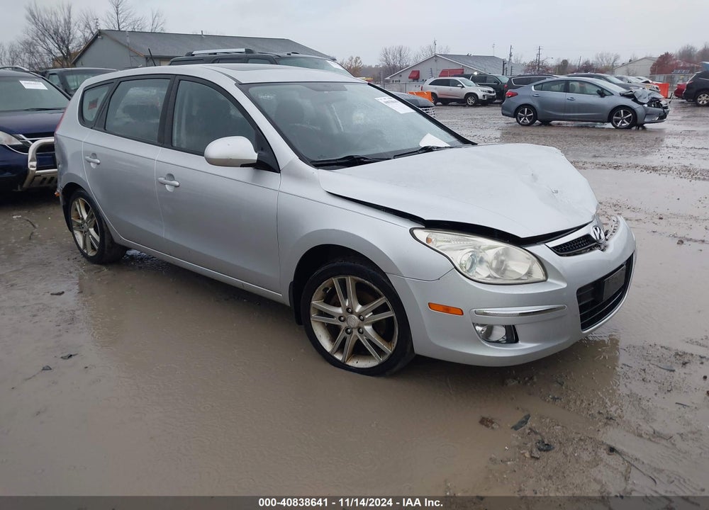2009 HYUNDAI ELANTRA TOURING VIN: KMHDC86E49U032879