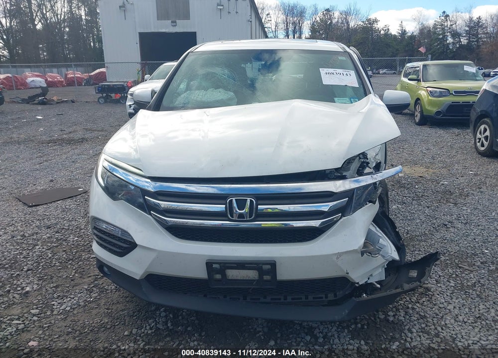 2018 HONDA PILOT EX-L VIN: 5FNYF6H55JB041392