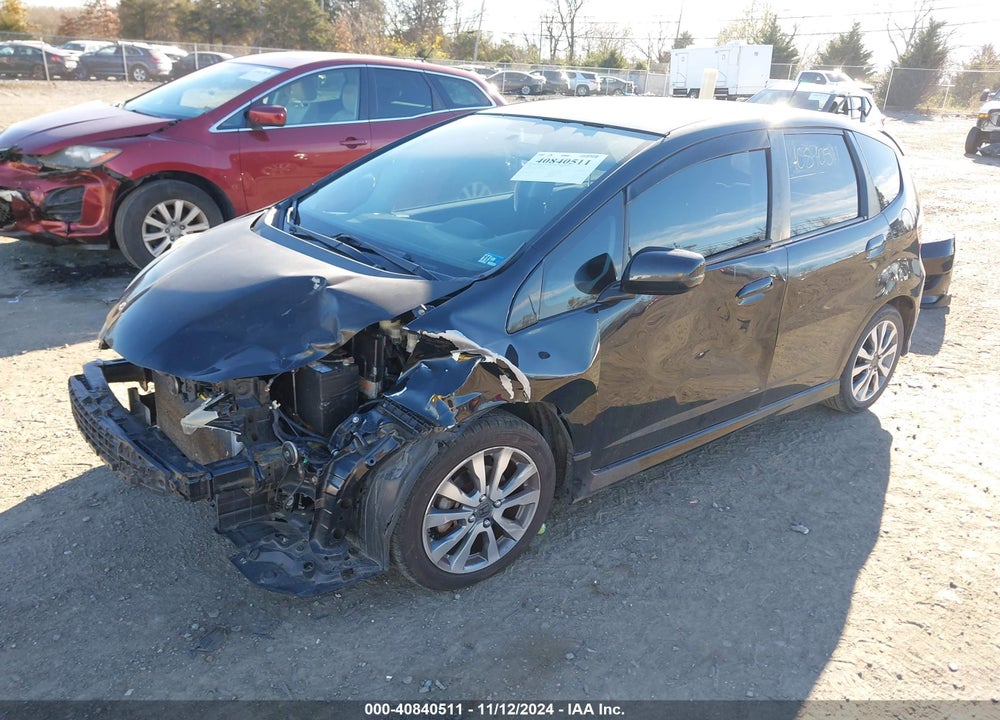2009 HONDA FIT VIN: JHMGE874X9S040917