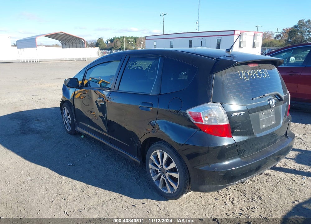 2009 HONDA FIT VIN: JHMGE874X9S040917
