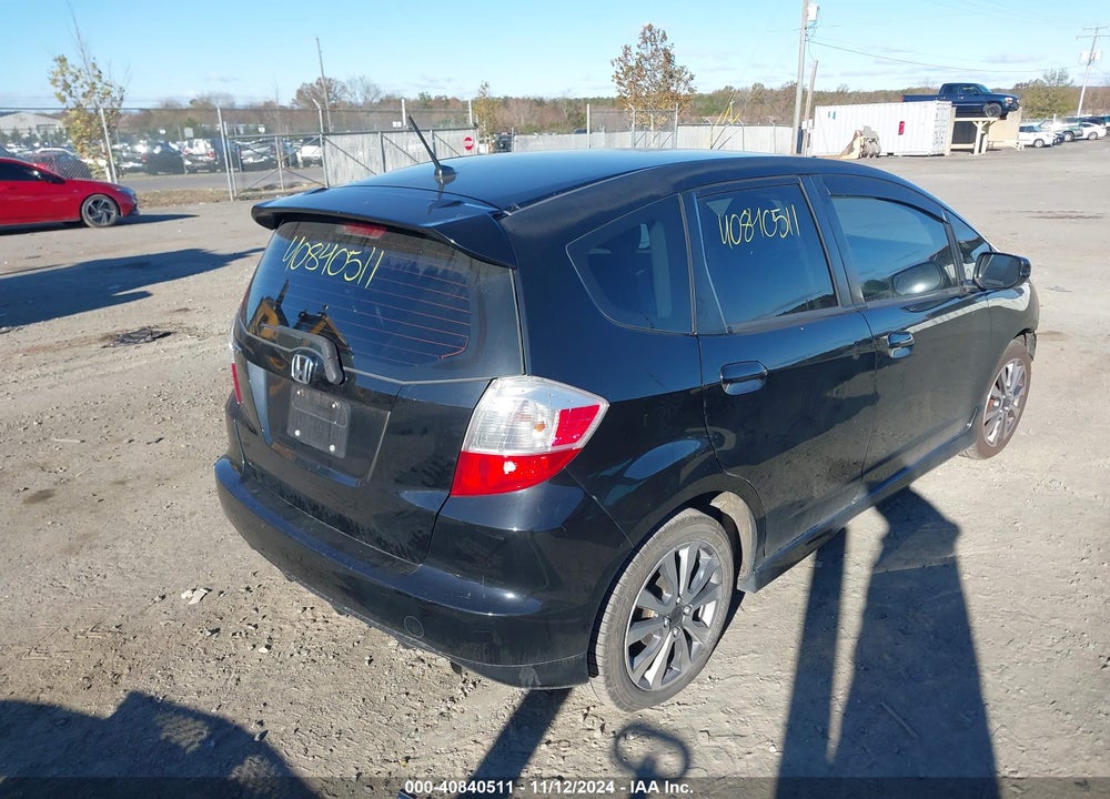 2009 HONDA FIT VIN: JHMGE874X9S040917