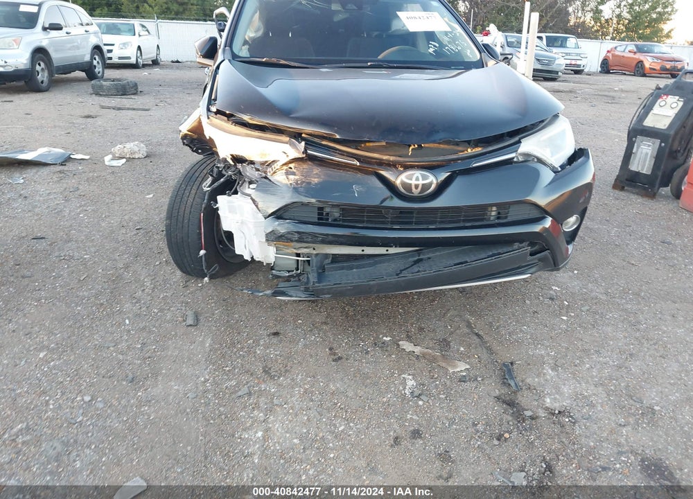 2018 TOYOTA RAV4 VIN: 2T3RFREV2JW762306