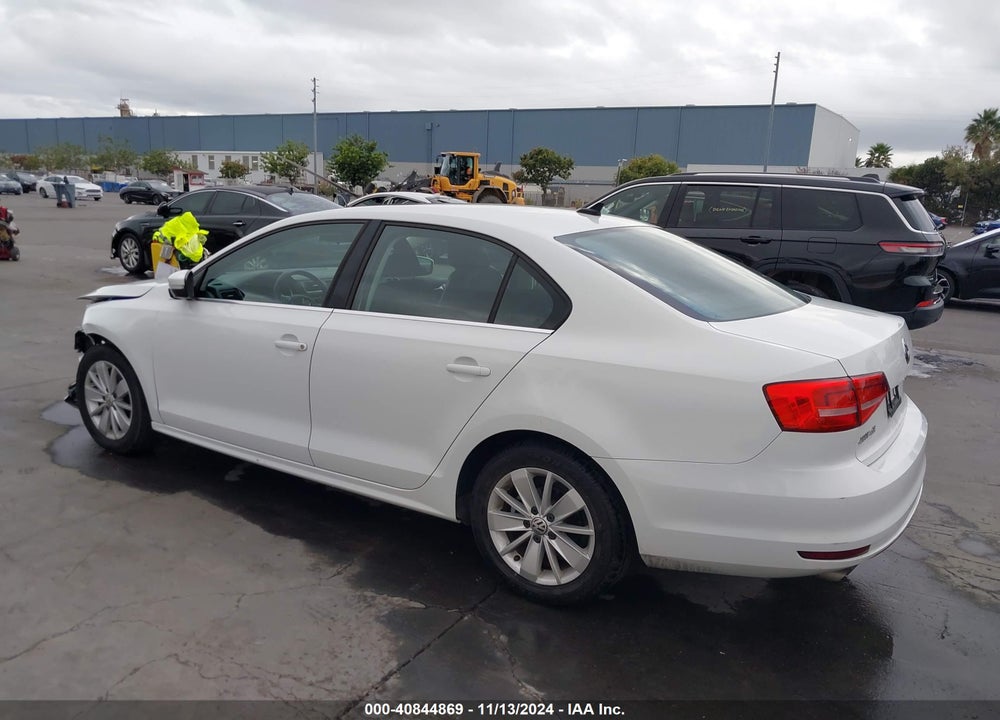 2015 VOLKSWAGEN JETTA 1.8T SE VIN: 3VWD17AJXFM300663