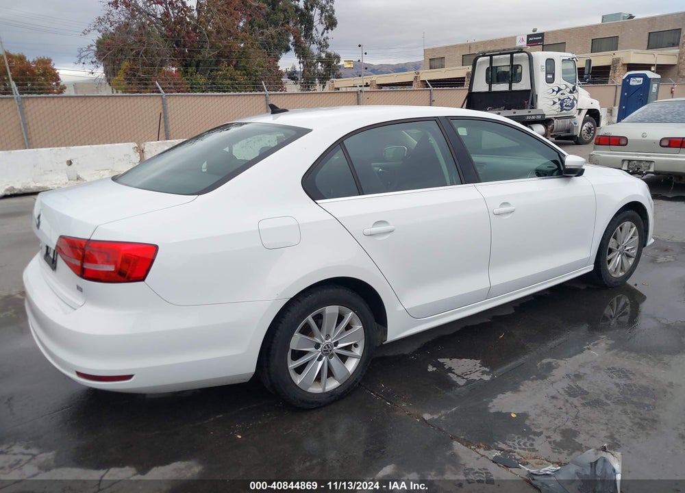 2015 VOLKSWAGEN JETTA 1.8T SE VIN: 3VWD17AJXFM300663
