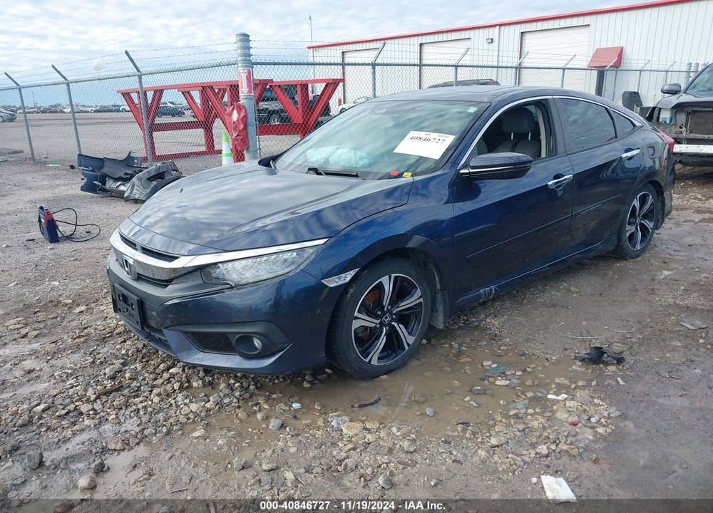2016 HONDA CIVIC TOURING VIN: 19XFC1F97GE002682