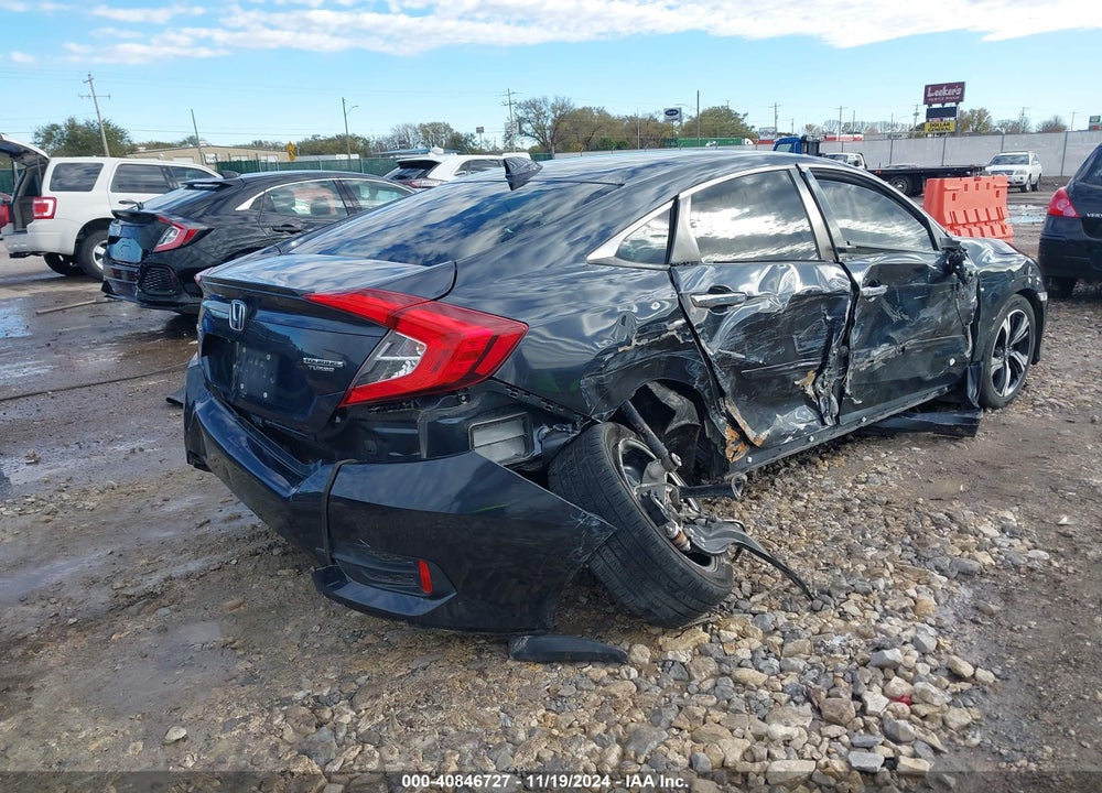 2016 HONDA CIVIC TOURING VIN: 19XFC1F97GE002682