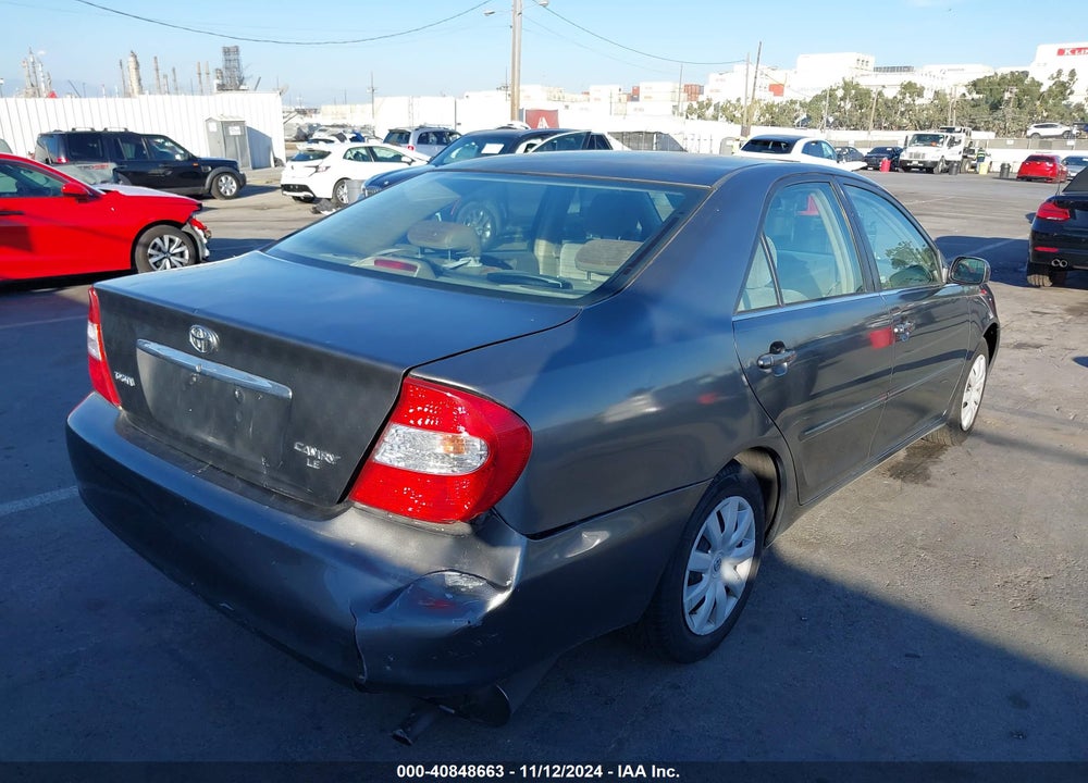 2003 TOYOTA CAMRY XLE VIN: JTDBE32K030232855