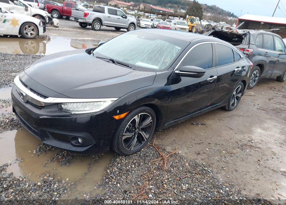 2016 HONDA CIVIC TOURING VIN: 19XFC1F96GE001247