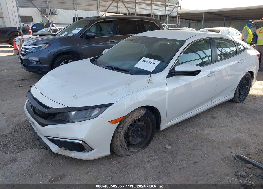 2019 HONDA CIVIC LX VIN: 19XFC2F6XKE030285