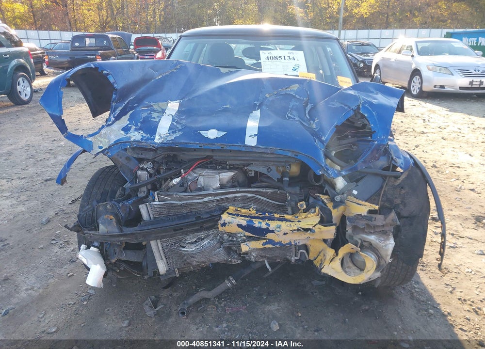 2007 MINI COOPER VIN: WMWMF33537TU60042
