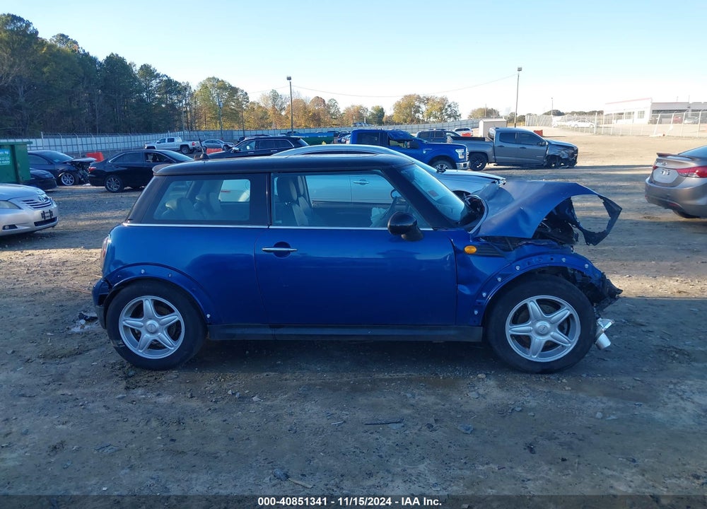 2007 MINI COOPER VIN: WMWMF33537TU60042