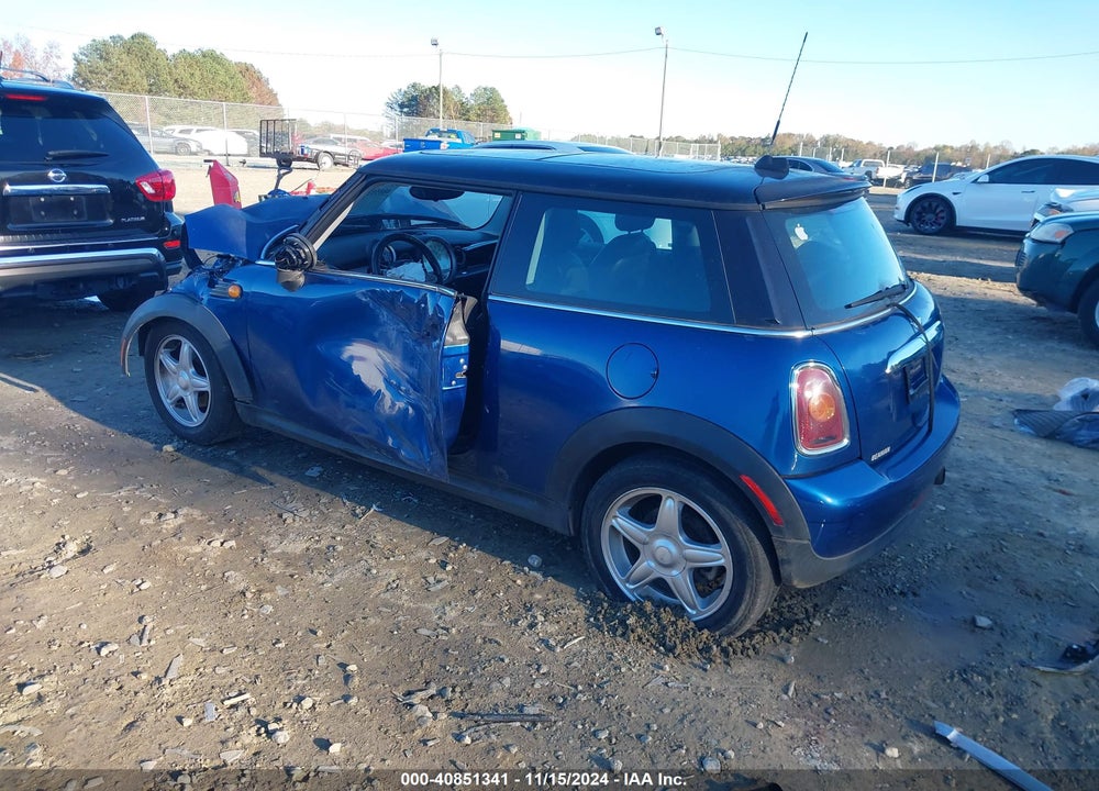 2007 MINI COOPER VIN: WMWMF33537TU60042