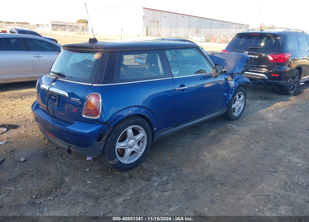 2007 MINI COOPER VIN: WMWMF33537TU60042