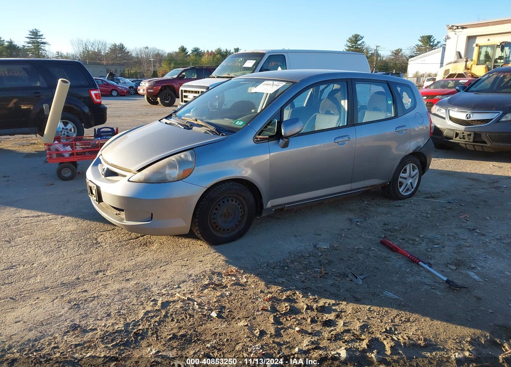 2007 HONDA FIT VIN: JHMGD37437S059036