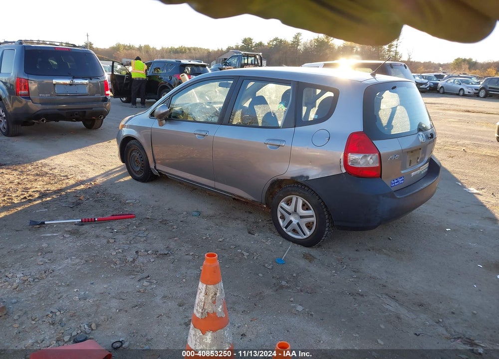 2007 HONDA FIT VIN: JHMGD37437S059036