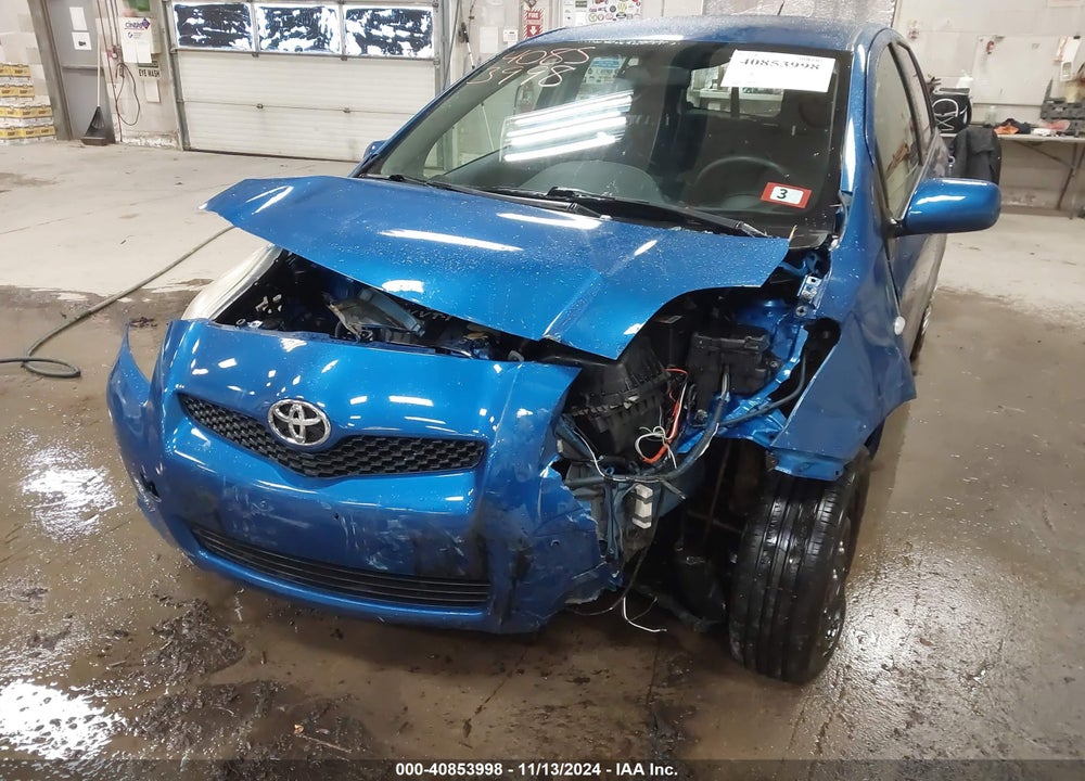 2009 TOYOTA YARIS VIN: JTDKT903595235282