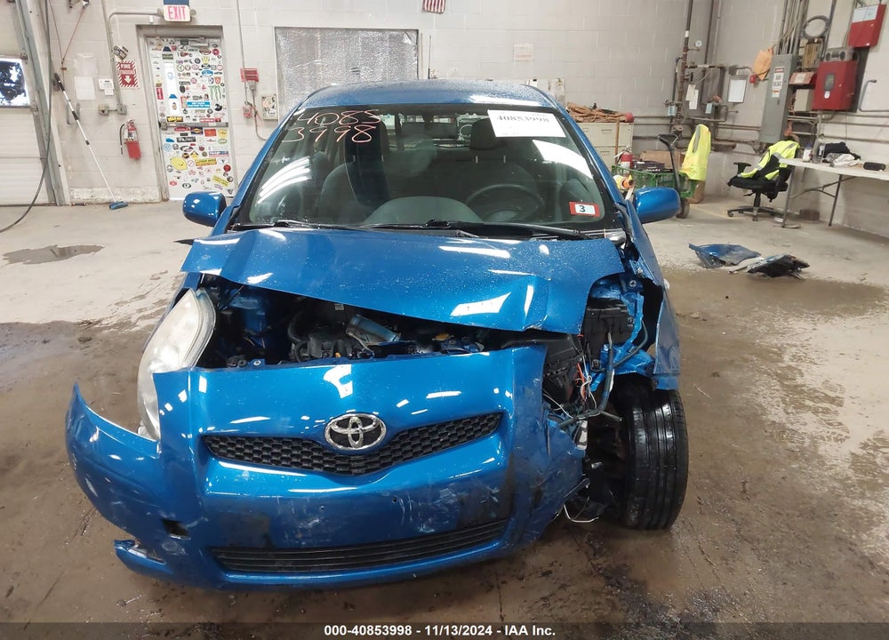 2009 TOYOTA YARIS VIN: JTDKT903595235282