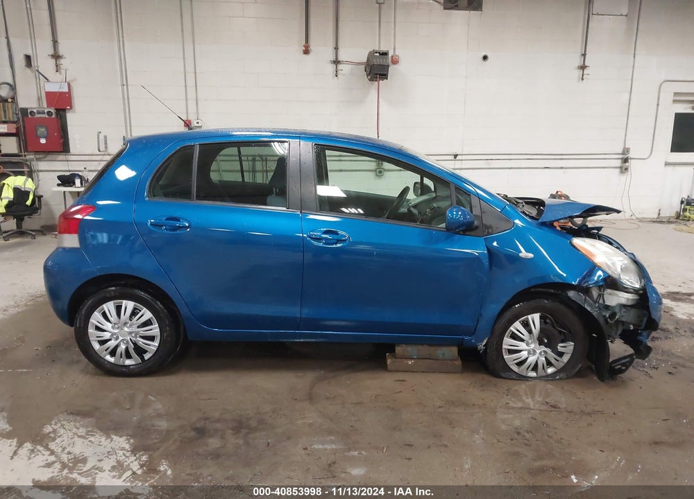 2009 TOYOTA YARIS VIN: JTDKT903595235282