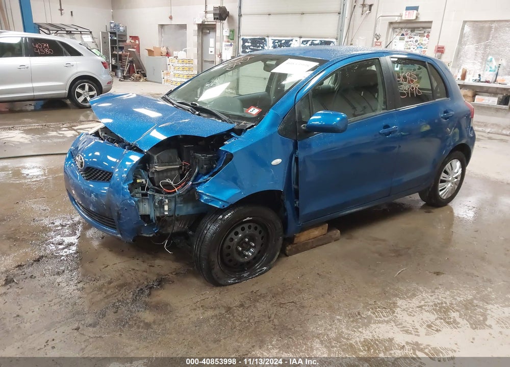 2009 TOYOTA YARIS VIN: JTDKT903595235282