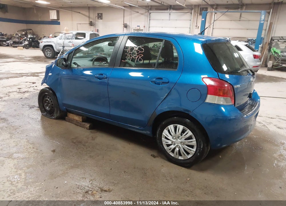 2009 TOYOTA YARIS VIN: JTDKT903595235282