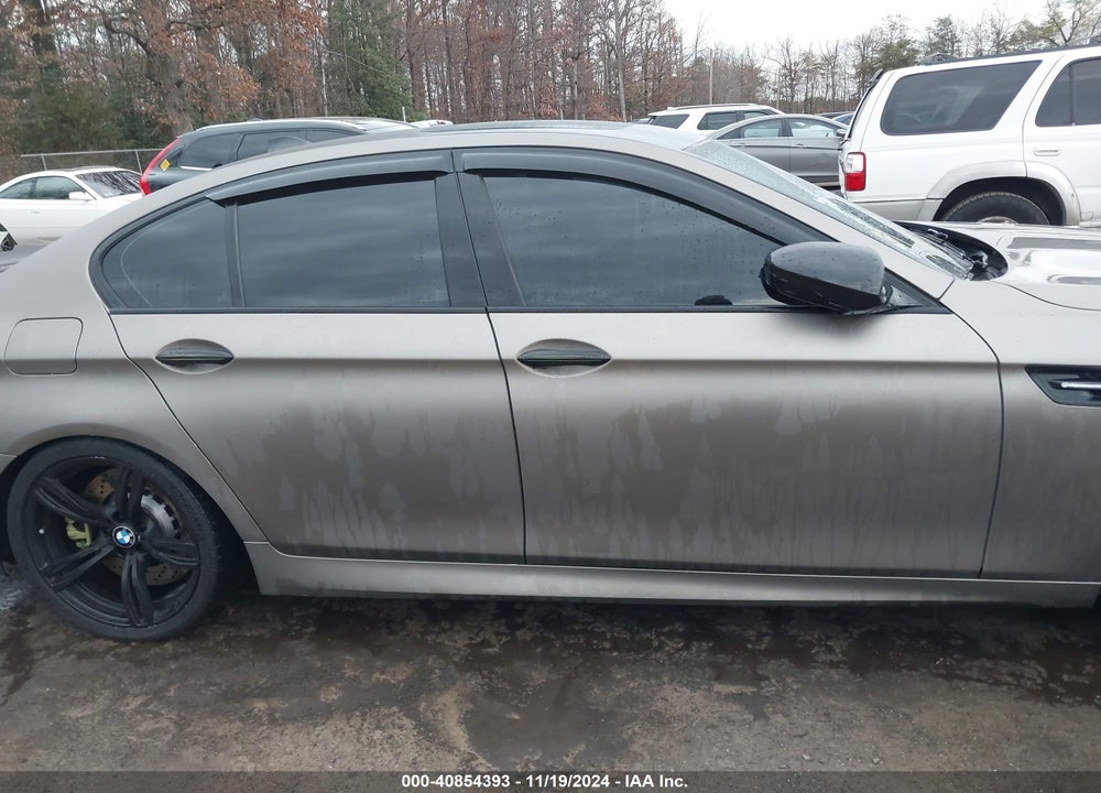 2015 BMW M5 VIN: WBSFV9C57FD594670