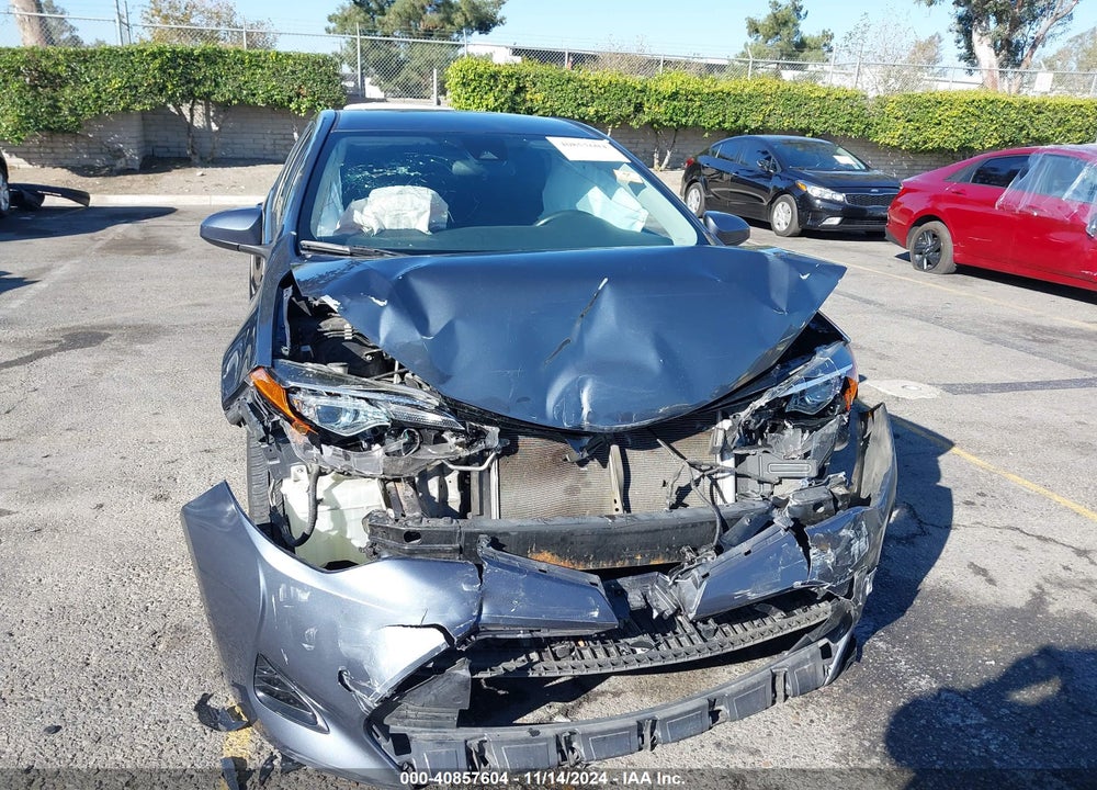 2018 TOYOTA COROLLA LE VIN: 5YFBURHE1JP795312