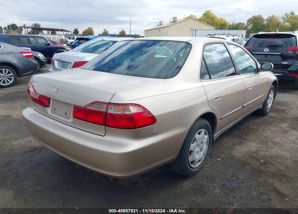 2000 HONDA ACCORD 2.3 LX VIN: 3HGCG6659YG703006
