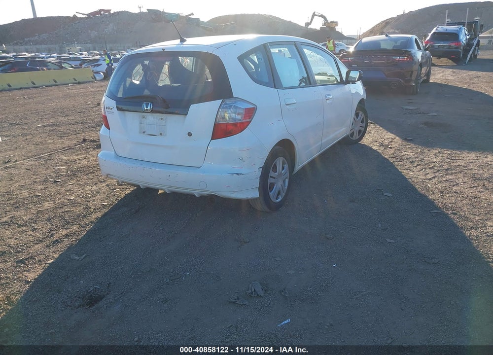 2010 HONDA FIT VIN: JHMGE8H27AC028624