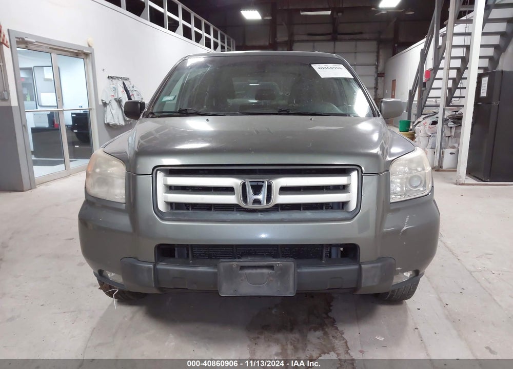 2007 HONDA PILOT EX-L VIN: 5FNYF18597B022579