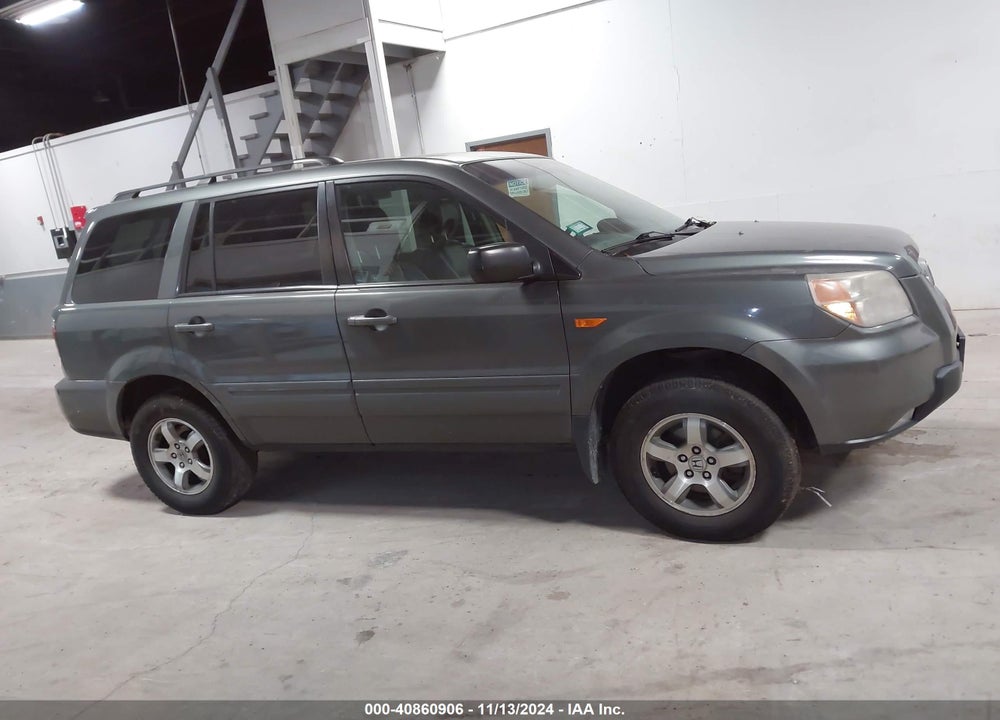 2007 HONDA PILOT EX-L VIN: 5FNYF18597B022579