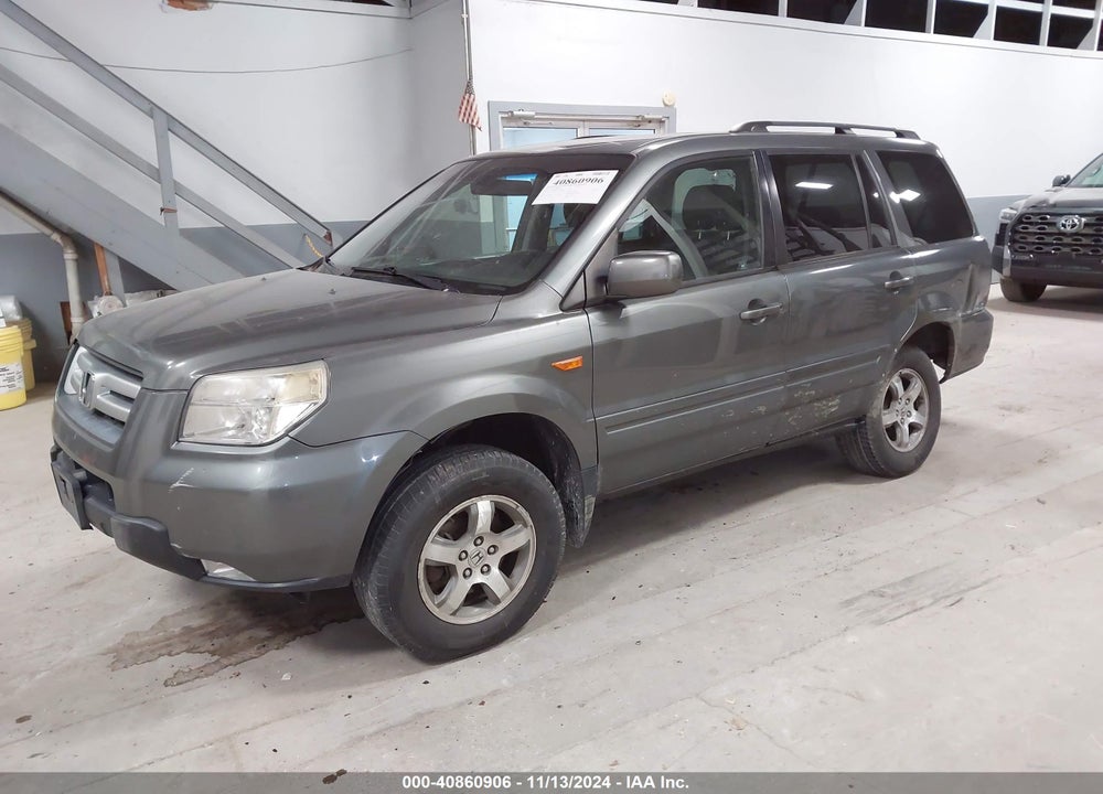 2007 HONDA PILOT EX-L VIN: 5FNYF18597B022579
