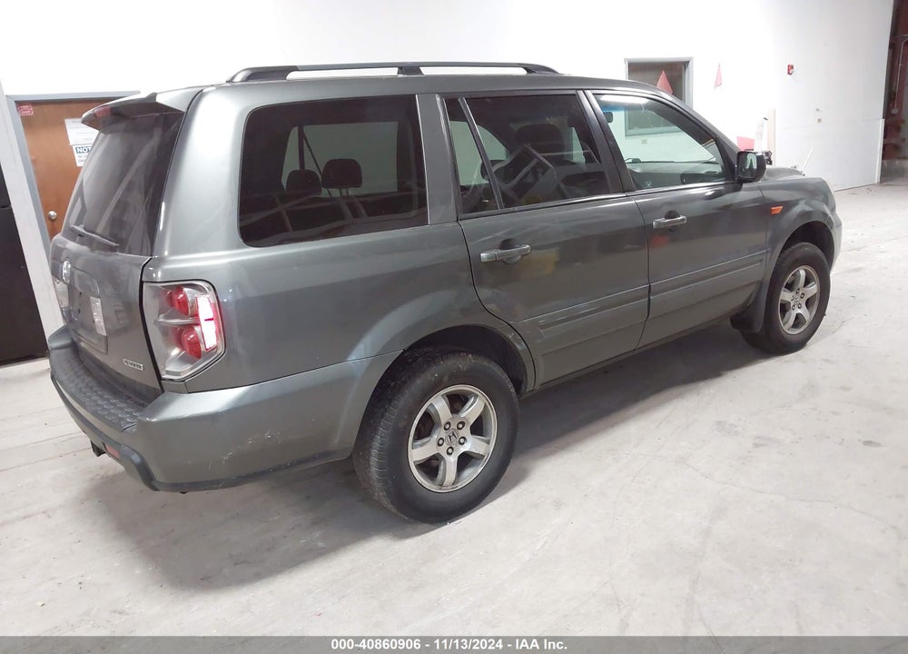 2007 HONDA PILOT EX-L VIN: 5FNYF18597B022579