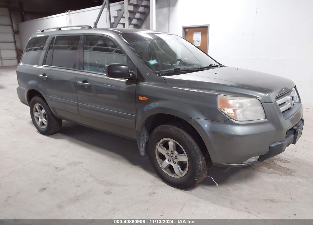 2007 HONDA PILOT EX-L VIN: 5FNYF18597B022579